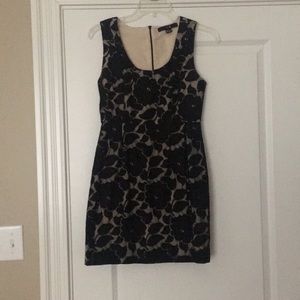 Black lace detailing on top of cream base dress!!